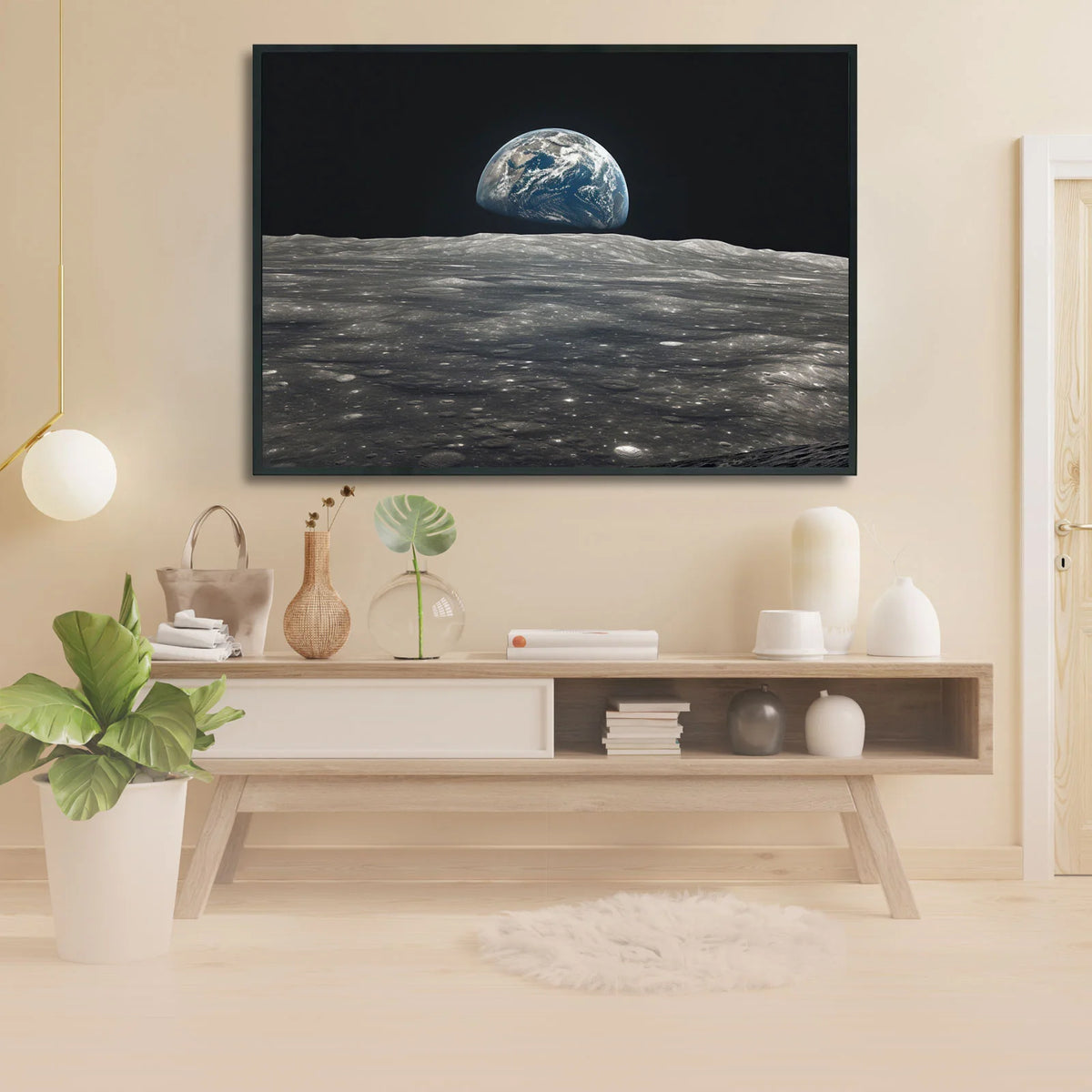 Crater‑covered lunar surface stretches across foreground, blue half‑lit earth hangs above moon’s horizon against deep pitch‑black outer space background